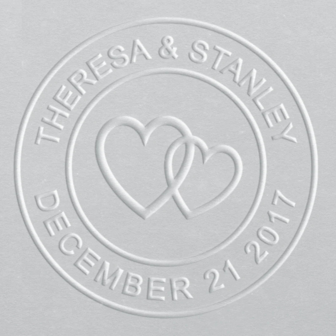 embosser for wedding with entwined hearts design