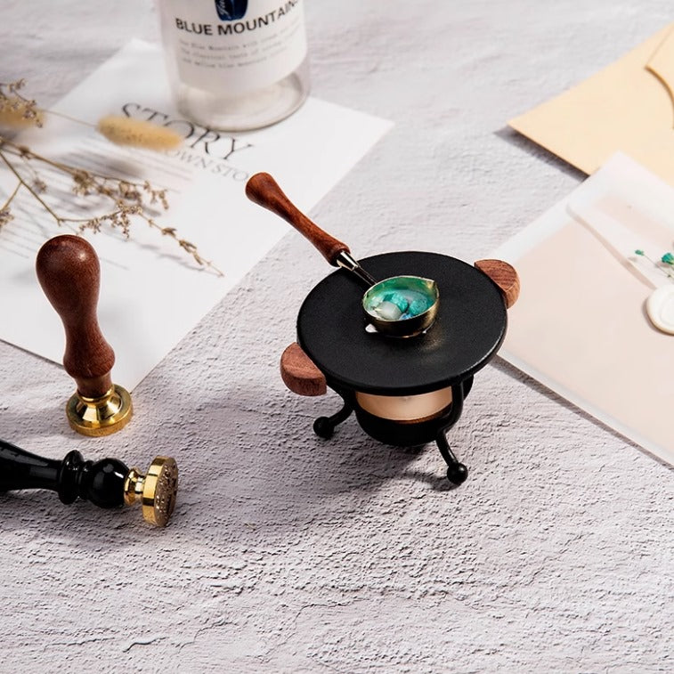 wax melt kit with a candle and spoon