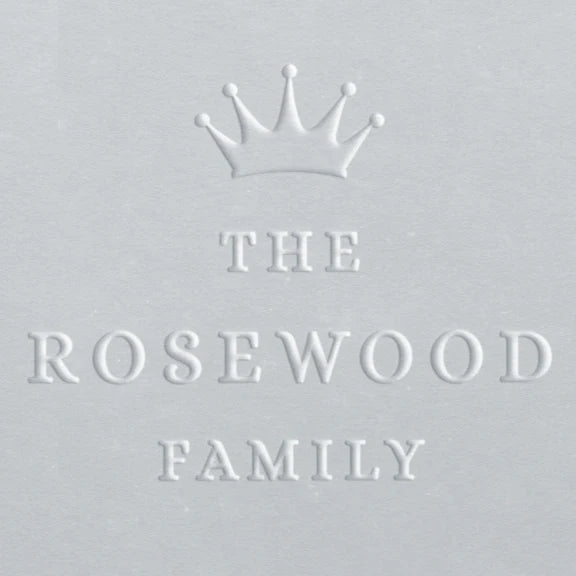 custom family name embosser with crown design